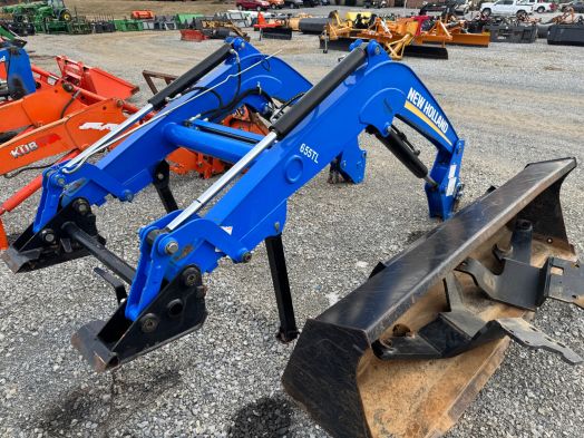 New Holland 655TL loader with brackets off of a NH Powerstar 75
