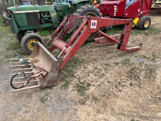 International 2050 loader with joystick valve.