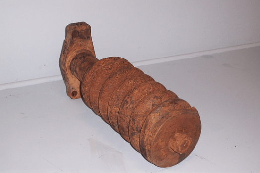 Case Track Adjustment Cylinder